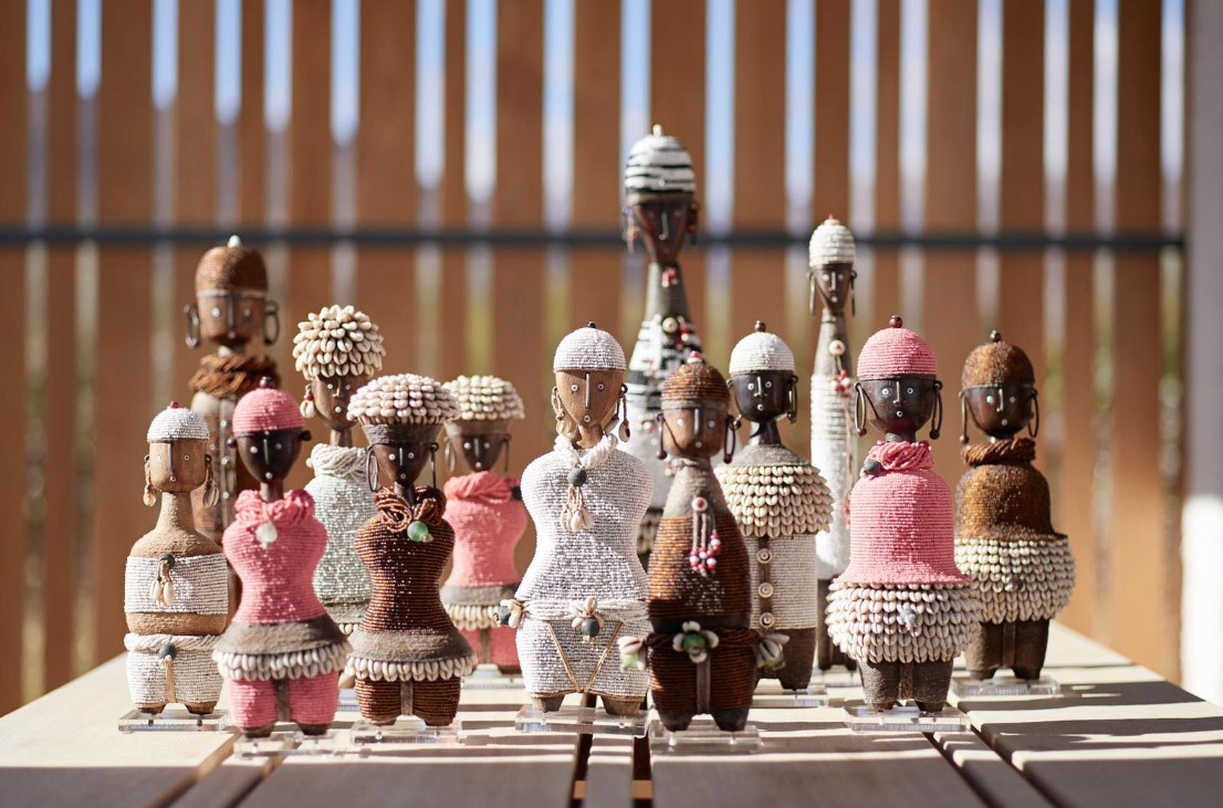 Step into the world of Heritage Décor's Namji Dolls, where tradition, craftsmanship, and cultural heritage intertwine to create enchanting works of art. These exquisite dolls pay homage to the Namji people of Cameroon, capturing the essence of their vibrant culture and rich artistic traditions.Heritage Décor is dedicated to preserving and showcasing traditional craft techniques from around the world. With deep respect for the Namji people and their heritage, they collaborate directly with skilled artisans t