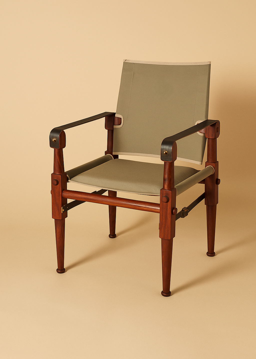 Stylish and comfortable chair with a warm mahogany frame and a canvas back and seat, positioned against a muted background that accentuates its clean lines and sophisticated design suitable for luxury interior decor.