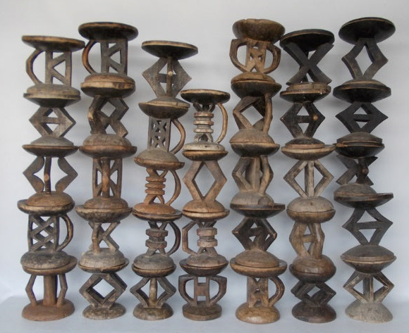 Immerse yourself in the captivating world of Heritage Décor's Tonga Stools, where age-old traditions and exquisite craftsmanship come together to create extraordinary pieces of functional art. These hand-carved stools are a testament to the rich cultural heritage of the Tonga people, an indigenous community in Africa known for their artistic skills and deep connection to their ancestral roots.Each Tonga Stool is meticulously crafted by skilled artisans who have inherited the knowledge and techniques passed