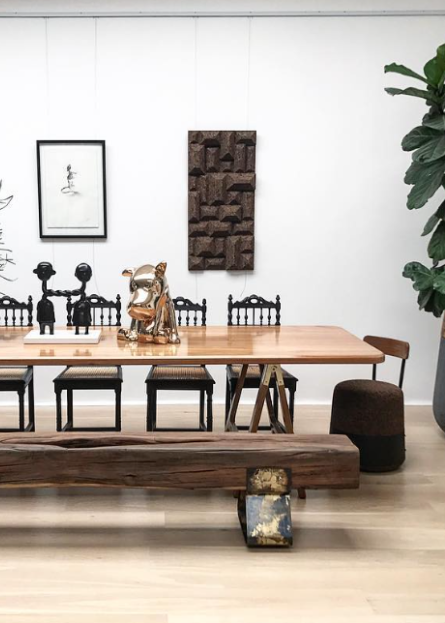 kanju interiors Wiid Design light or dark cork and black stainless steel dining chair or desk chair, a masterpiece in luxury home decor. Its design combines timeless elegance with contemporary flair. Perfect for upscale dining rooms, this chair embodies sophisticated style and the fine craftsmanship of African design, appealing to those who appreciate unique, artisanal furniture.