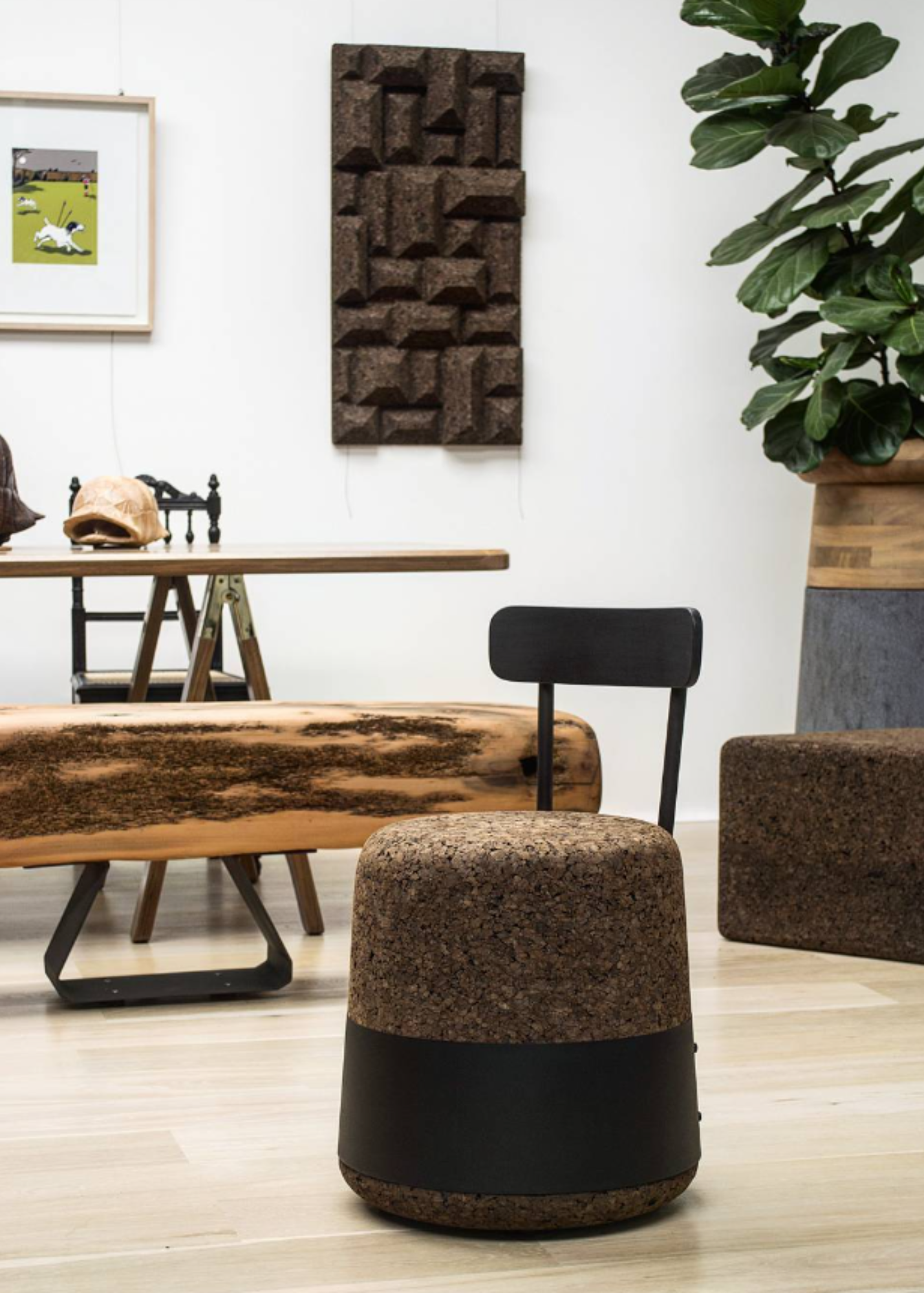 kanju interiors Wiid Design light or dark cork and black stainless steel dining chair or desk chair, a masterpiece in luxury home decor. Its design combines timeless elegance with contemporary flair. Perfect for upscale dining rooms, this chair embodies sophisticated style and the fine craftsmanship of African design, appealing to those who appreciate unique, artisanal furniture.