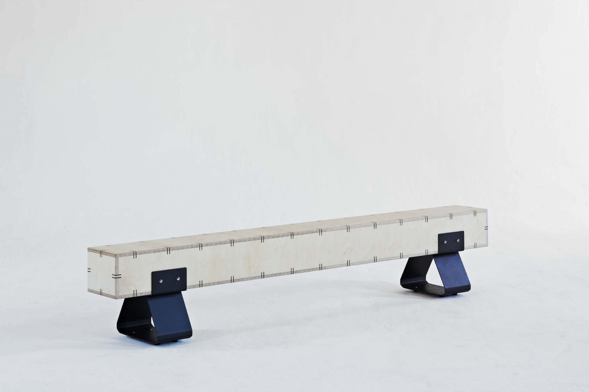kanju interiors Wiid Design birch wood and black stainless steel bench, a masterpiece in luxury home decor, featuring an expansive. Its design combines timeless elegance with contemporary flair, minimalist base for a floating effect. Perfect for upscale dining rooms, living rooms or bedrooms, this bench embodies sophisticated style and the fine craftsmanship of African design, appealing to those who appreciate unique, artisanal furniture.