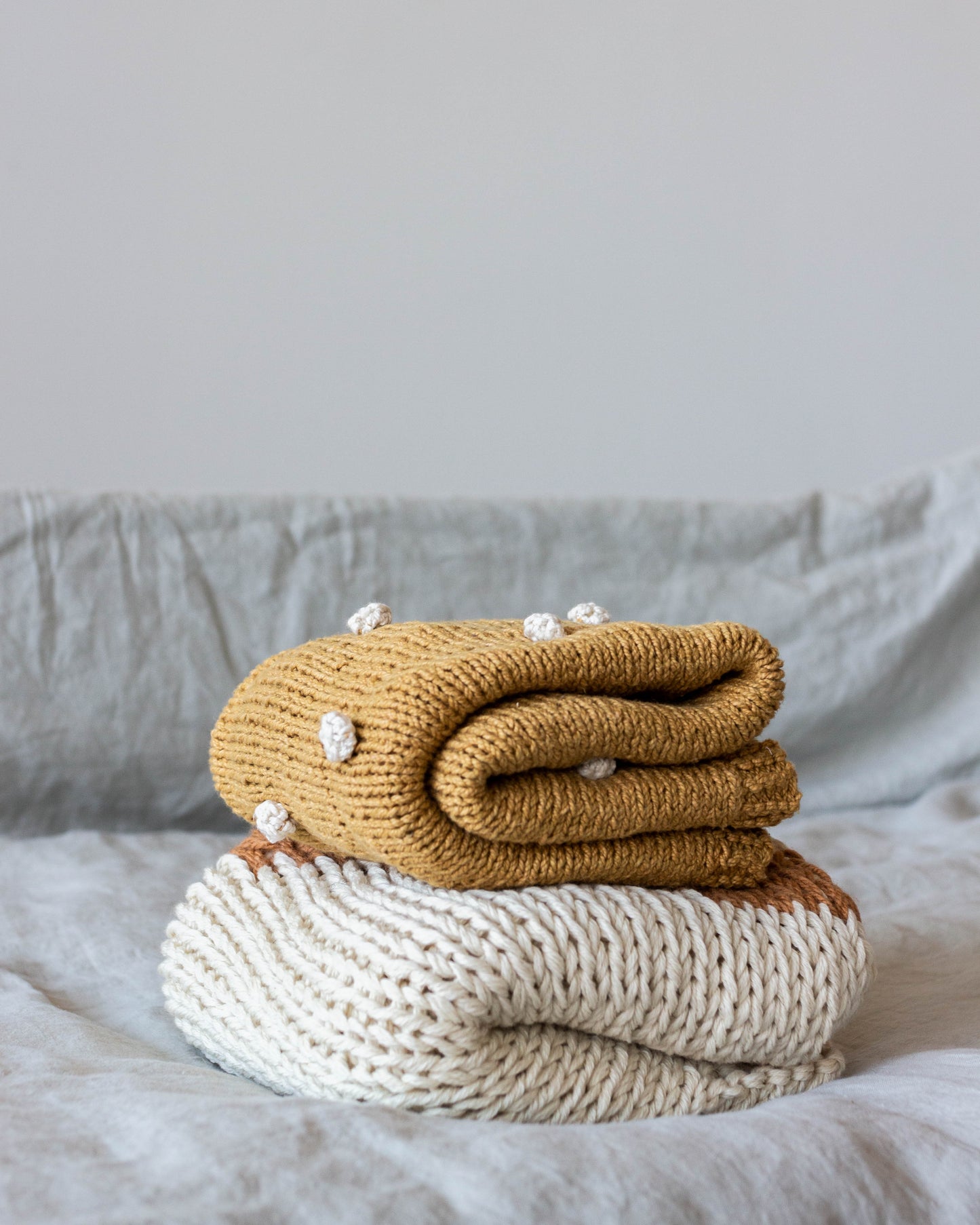 Babydecke mit Bommel