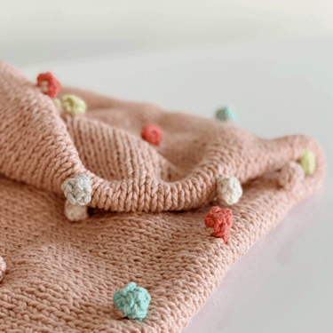 Babydecke mit Bommel