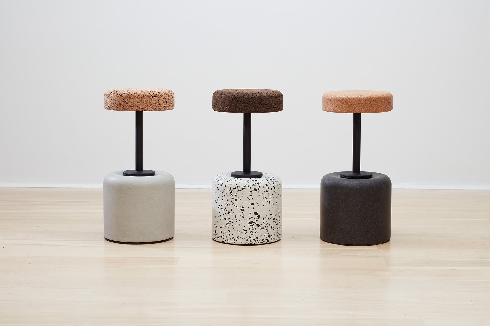 Kanju Collection: Wiid Design Cork Swivel Counter & Bar Stools in an array of finishes - charcoal grey, concrete grey, and terrazzo. Each stool embodies the fusion of luxury and sustainability, with eco-friendly materials and cutting-edge South African design, catering to sophisticated tastes and diverse interior styles.