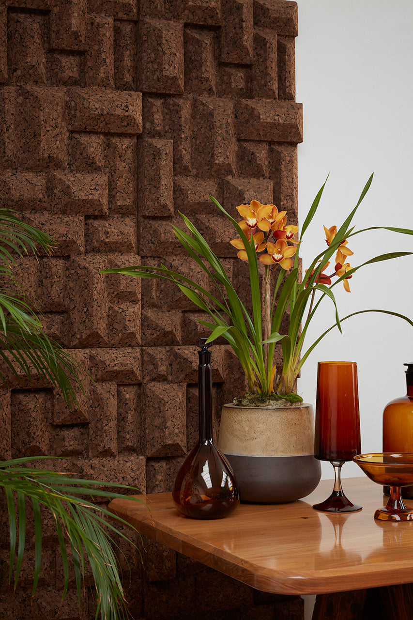 Kanju's Wiid Angular Cork Wall Panels, a testament to innovative African design, these eco-friendly panels feature a striking angular pattern that adds depth and texture to luxury interiors. Crafted from sustainable cork, they offer both aesthetic appeal and acoustic benefits, perfect for sophisticated spaces seeking an elegant, contemporary touch.