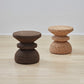kanju interiors Wiid Design cork end table or stool, a masterpiece in luxury home decor. Its design combines timeless elegance with contemporary flair. Perfect for upscale Living rooms, dining room or bedrooms, this stool embodies sophisticated style and the fine craftsmanship of African design, appealing to those who appreciate unique, artisanal furniture.