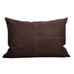 Brown leather pillow on a white background
