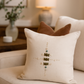 Decorative pillow with a unique pattern on a beige sofa in a cozy living room.