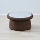 kanju interiors Wiid Design cork coffee table with terrazzo inlay, a masterpiece in luxury home decor. Its design combines timeless elegance with contemporary flair. Perfect for upscale, this coffee table embodies sophisticated style and the fine craftsmanship of African design, appealing to those who appreciate unique, artisanal furniture.
