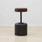 Luxurious Kanju Wiid Design Cork Swivel Counter & Bar Stool, featuring a sleek charcoal grey finish, combines contemporary elegance with African craftsmanship, ideal for upscale home decor enthusiasts.