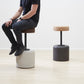 Collection of Kanju's Wiid Swivel Cork and Concrete Barstools charcoal showcasing a variety of finishes: Terrazzo, Natural Grey, and Charcoal Base. This image highlights the diversity and sophistication of the designs, featuring the unique texture of cork combined with durable concrete bases in different hues. Each barstool offers a blend of sustainable materials, swivel functionality, and contemporary style, suitable for modern bars and kitchens.