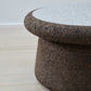 kanju interiors Wiid Design cork coffee table, a masterpiece in luxury home decor. Its design combines timeless elegance with contemporary flair. Perfect for upscale, this coffee table embodies sophisticated style and the fine craftsmanship of African design, appealing to those who appreciate unique, artisanal furniture.