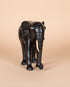 Black elephant figurine on a white background