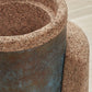 Kanju's Wiid Angled Cork Planter, an epitome of sustainable luxury, featuring a unique angular design that adds a contemporary twist to traditional plant keeping. Crafted from eco-friendly cork, this planter marries functionality with artistic flair, perfect for infusing high-end interiors with a touch of greenery and African-inspired design