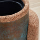 Sophisticated Kanju Wiid Angled Cork Planter with durable liner, seamlessly combining eco-luxury with practical design. This distinctive piece, crafted from sustainable cork, features an innovative angled silhouette, enhancing any upscale decor with its blend of natural beauty and contemporary African craftsmanship, ideal for showcasing indoor plants.