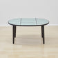 Luxuriously crafted Kanju Wiid Ceramic Oval Table, a centerpiece of modern elegance. Its sleek, oval-shaped ceramic top exudes sophistication, complemented by a robust base that merges durability with contemporary design. Ideal for upscale interiors, this table encapsulates the essence of refined, African-inspired luxury decor.
