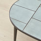 Kanju Wiid Ceramic Oval Table, a masterpiece in luxury home decor, featuring an expansive, sleek ceramic top with an elegant oval silhouette. Its design combines timeless elegance with contemporary flair, set on a minimalist base for a floating effect. Perfect for upscale dining rooms, this table embodies sophisticated style and the fine craftsmanship of African design, appealing to those who appreciate unique, artisanal furniture.