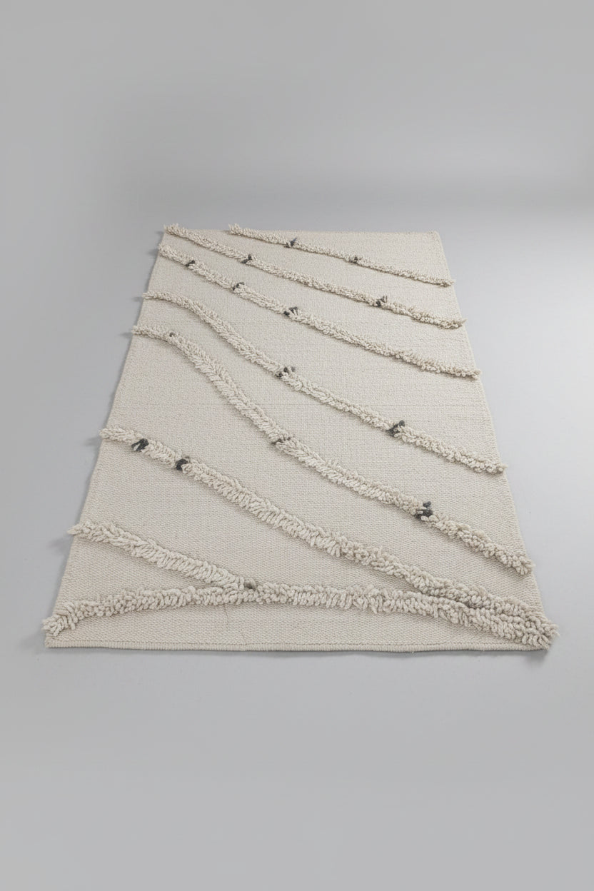 Textured gray mat with a diamond pattern on a dark surface