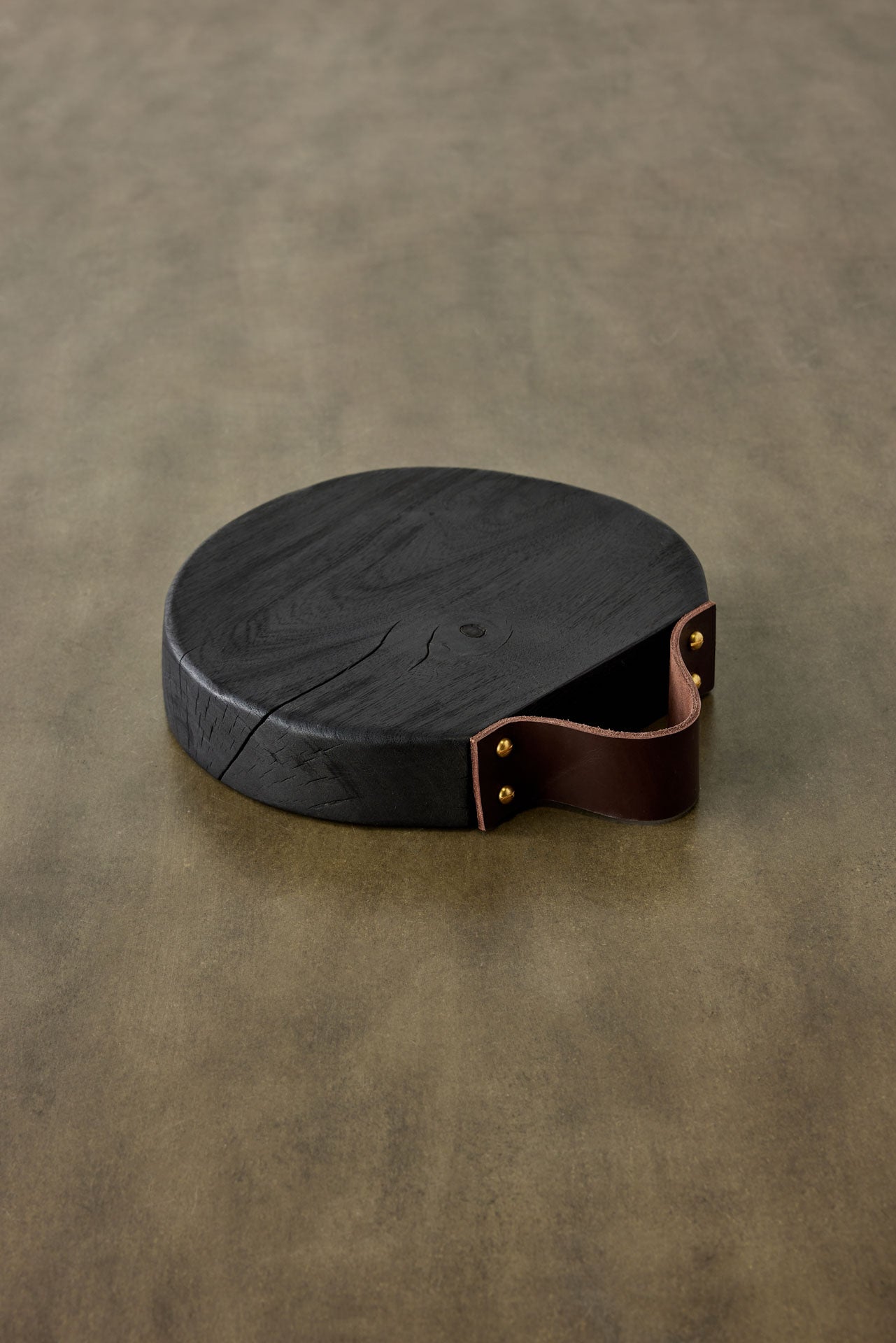 Round Blackened Wood Cutting Board with Leather Strap – Char Transfer Present