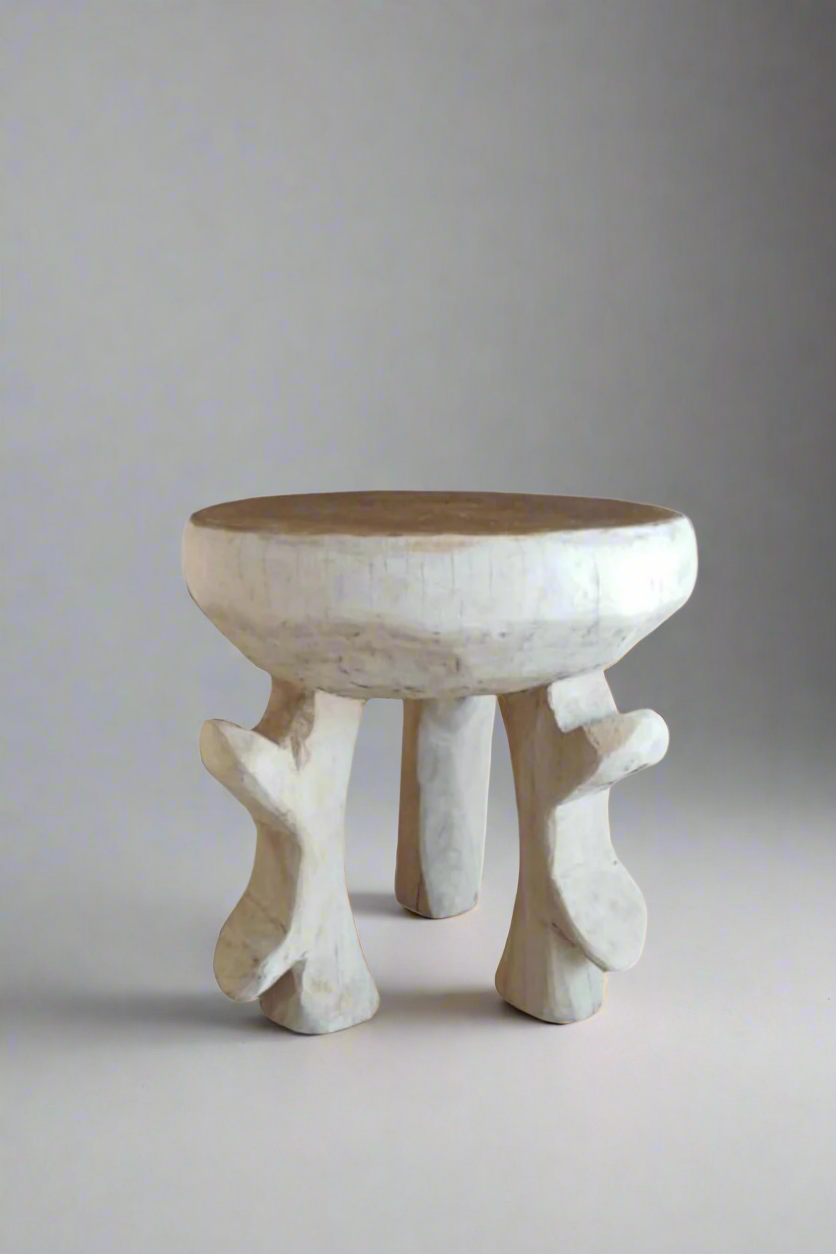 Decorative bowl with wooden top and white base on a white background
