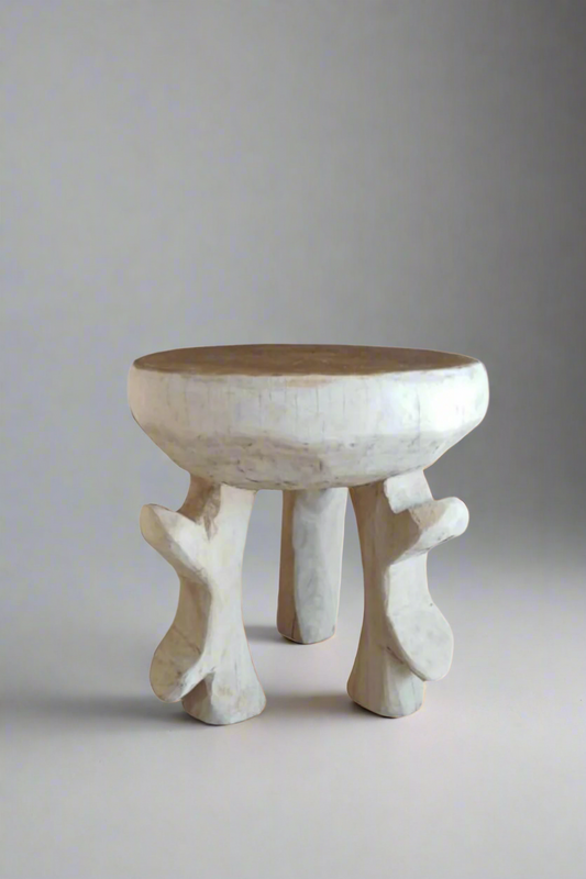 Decorative bowl with wooden top and white base on a white background