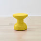 Vivid Kanju African Painted Slim Cork Stool in bright yellow, capturing the essence of sustainable luxury with a sleek design. This handcrafted stool blends vibrant color with the natural texture of cork, offering a stylish, eco-conscious addition to any modern decor.
