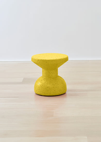 Vivid Kanju African Painted Slim Cork Stool in bright yellow, capturing the essence of sustainable luxury with a sleek design. This handcrafted stool blends vibrant color with the natural texture of cork, offering a stylish, eco-conscious addition to any modern decor.