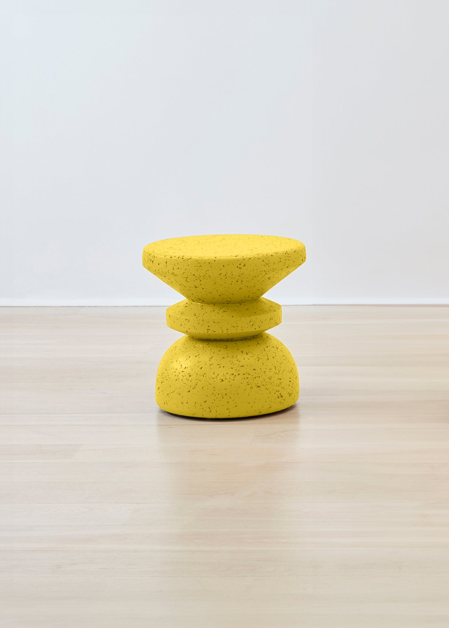 Bright and cheerful Kanju Wiid Design African Painted Stacked Cork Stool in a vibrant yellow hue, embodying the spirit of African artisanship with a modern twist. This eco-friendly, eye-catching piece combines functionality with bold aesthetic appeal, perfect for adding a pop of color and sustainable design to any interior.