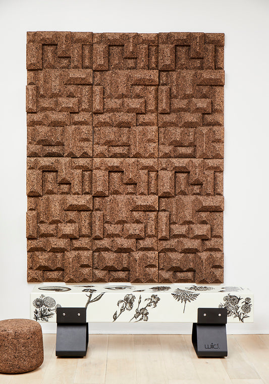 Kanju's Wiid Angular Cork Wall Panels, a testament to sustainable innovation and luxury design. These panels feature a geometric, angular pattern that adds depth and texture to any space, crafted from eco-friendly cork to blend aesthetics with environmental consciousness. Perfect for elevating the ambiance of high-end interiors with a touch of contemporary African craftsmanship.