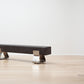 kanju interiors Wiid Design concrete benches, powder matte black stainless steel legs or polished steel legs, a masterpiece in luxury home decor. Its design combines timeless elegance with contemporary artistic flair. Perfect for upscale Living rooms, dining room or bedrooms, this table embodies sophisticated style and the fine craftsmanship of African design, appealing to those who appreciate unique, artisanal furniture.