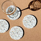 Neutrale Terrazzo-Untersetzer - 4er-Set