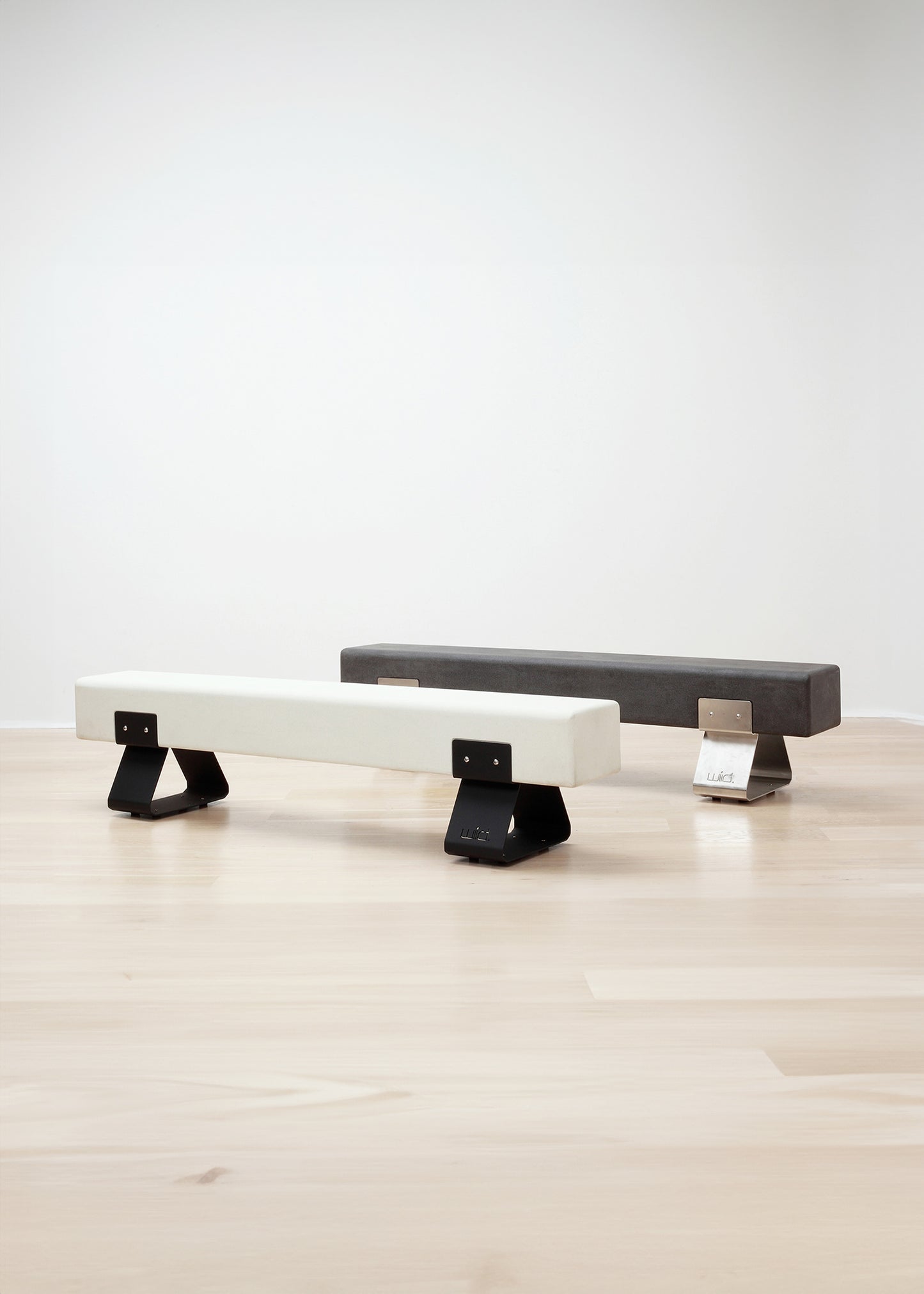 kanju interiors Wiid Design concrete bench in charcoal or white, powder matte black stainless steel legs or polished steel legs, a masterpiece in luxury home decor. Its design combines timeless elegance with contemporary artistic flair. Perfect for upscale Living rooms, dining room or bedrooms, this table embodies sophisticated style and the fine craftsmanship of African design, appealing to those who appreciate unique, artisanal furniture.