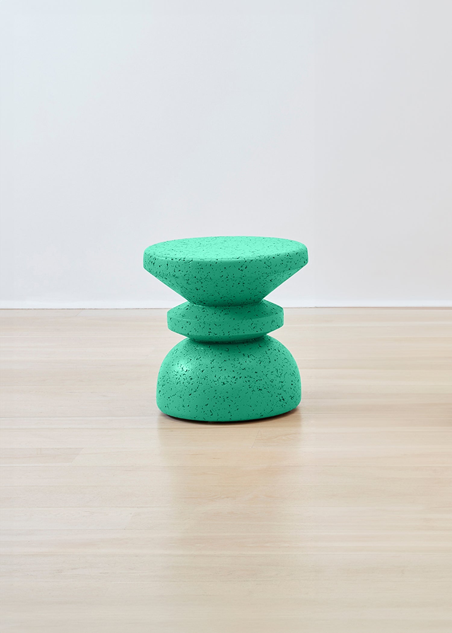 Striking Kanju Wiid African Stacked Cork Stool painted in a serene teal, blending innovative design with eco-sustainability. This visually appealing stool layers cork for a textured, contemporary look, ideal for adding a splash of color and artisanal charm to modern spaces.