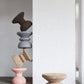 kanju interiors Wiid Design light cork, dark cork, pink cork stool, end table or stool, a masterpiece in luxury home decor. Its design combines timeless elegance with contemporary flair. Perfect for upscale Living rooms, dining room or bedrooms, this stool embodies sophisticated style and the fine craftsmanship of African design, appealing to those who appreciate unique, artisanal furniture.