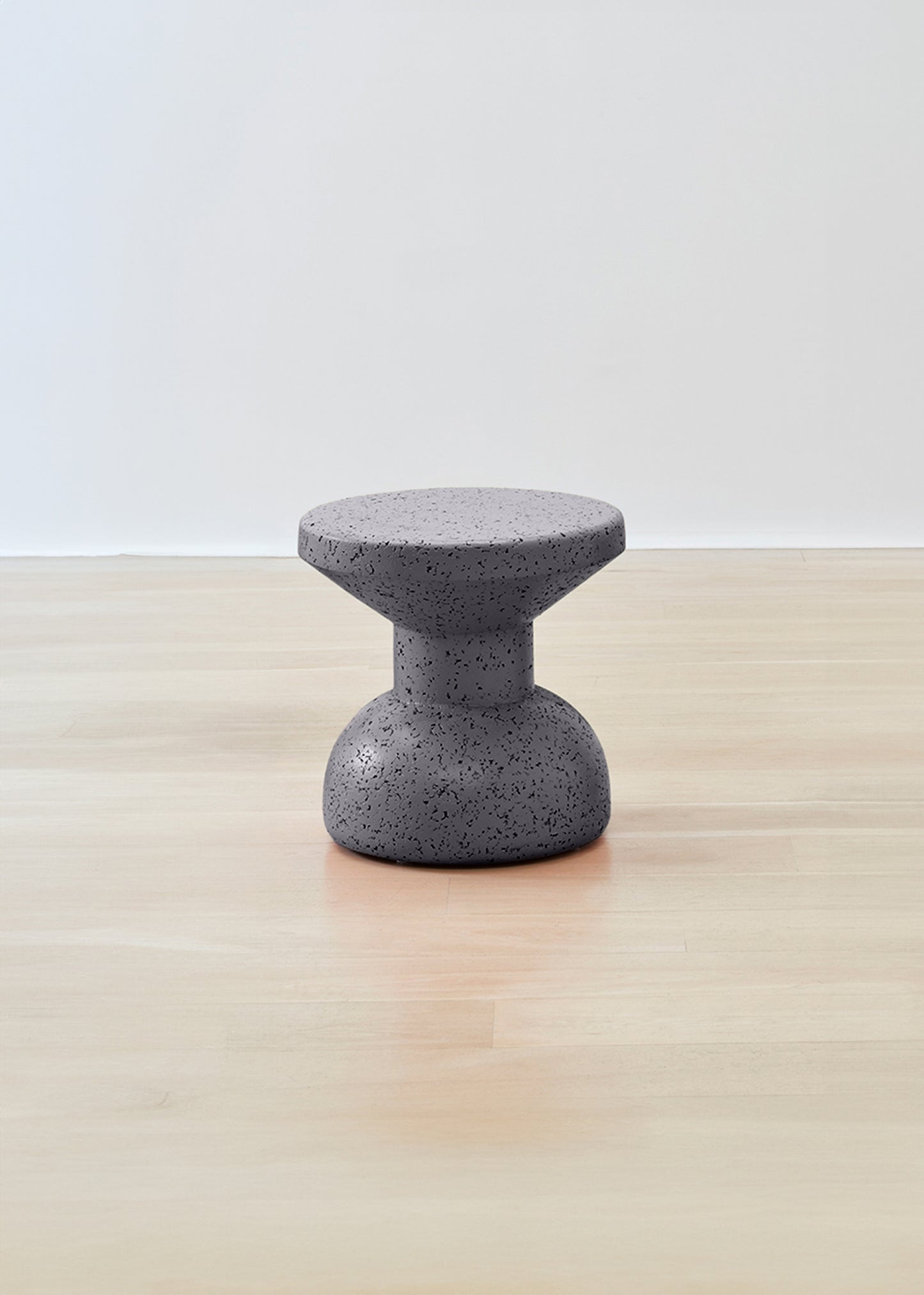 Sleek and elegant Kanju Wiid Painted African Slim Cork Stool in a chic grey finish, showcasing the perfect balance between modern aesthetics and sustainable design. This slim stool highlights the natural beauty of cork with a contemporary twist, ideal for adding a touch of sophistication to any eco-conscious interior.
