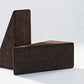 Discover Kanju's Wiid Triangle Cork Tables in rich Dark Cork, a testament to sustainable design and modern aesthetics. These tables showcase the beauty and versatility of cork, crafted into a geometric triangle shape that adds a unique, contemporary touch to any room. Ideal for those who appreciate eco-friendly materials and innovative design in their furniture choices.
