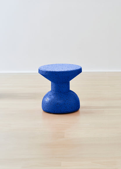 Sleek Kanju Wiid Painted African Slim Cork Stool in a serene blue shade, combining contemporary elegance with eco-friendly materials. This slim-profile stool showcases a vibrant blue finish, offering a stylish and sustainable choice for modern interiors seeking a splash of color and minimalist design.