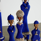 Afrikanische Namji-Puppe mit Tansanitperlen